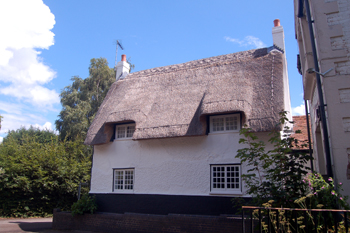 The Woburn Lane facade of Spinney Cottage July 2010